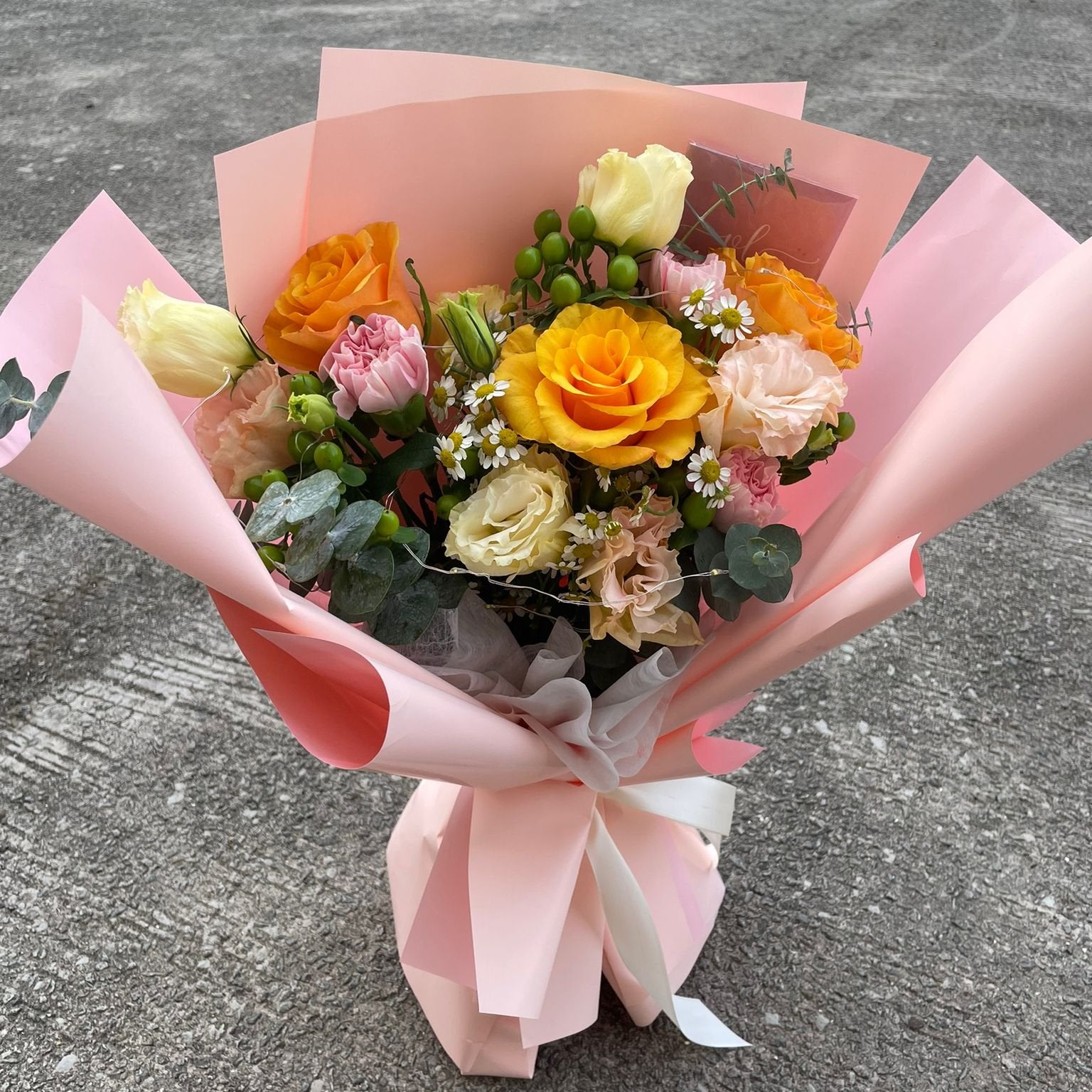 Our florist serves fresh white or pink color roses Bouquet in Singapore with special flowers such as baby breaths or caspia and eucalyptus at an affordable and best pricing. This is suitable for occasions such as birthdays, valentine's, anniversary, surprise, wedding, international women's day, grand opening or even condolences. it's a bouquet for all occasions