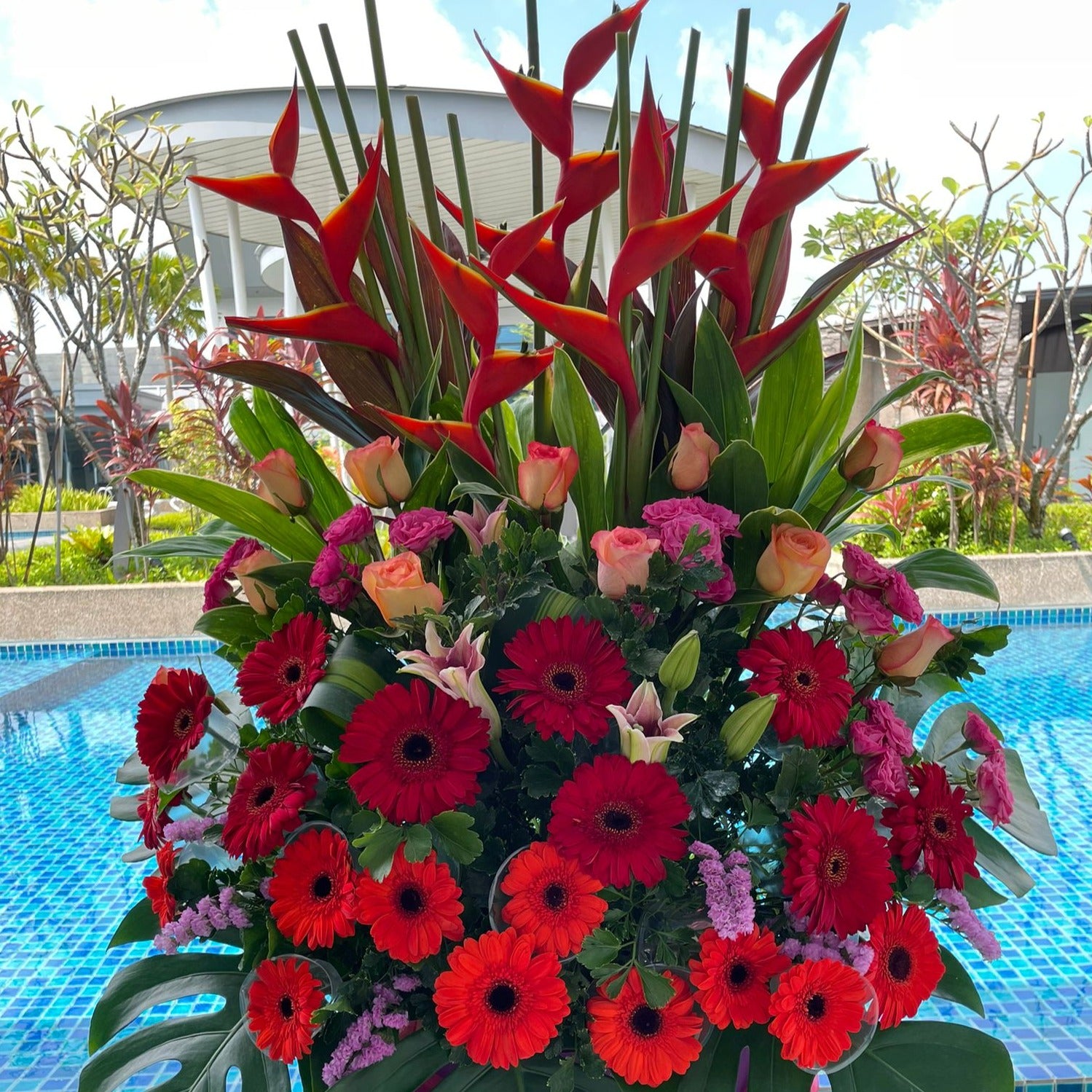 Cheap Fresh Heliconia, Roses, lilies and gerbera daises, static flower grand opening floral stand under $200 in Singapore Free Delivery
